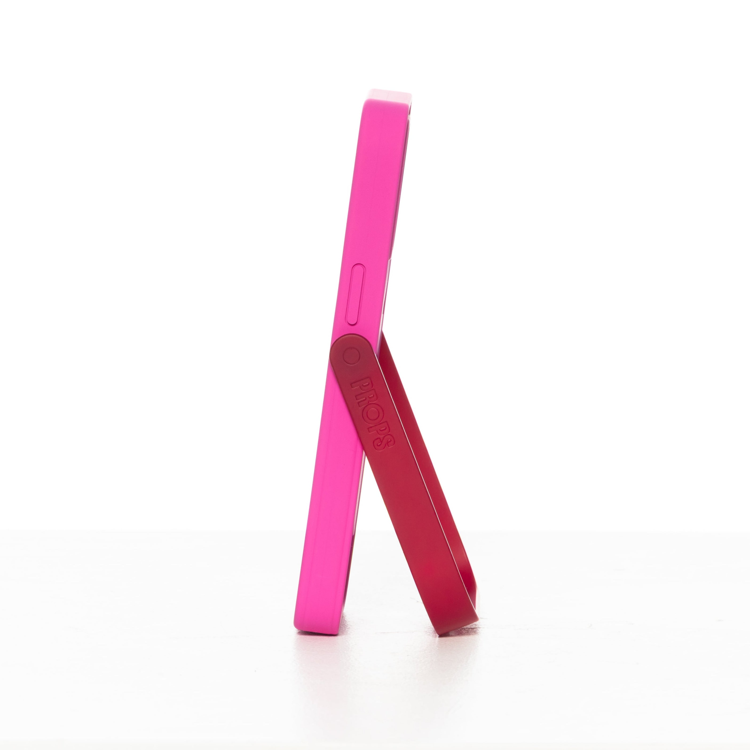 Pink phone case with stand on a white background