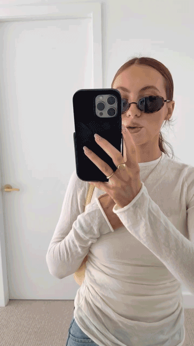 Fashion blogger takes mirror selfie with PROPS phone case